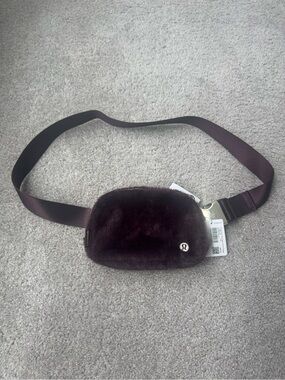 lululemon everywhere  Plush Belt Bag - Plum/gold NWT